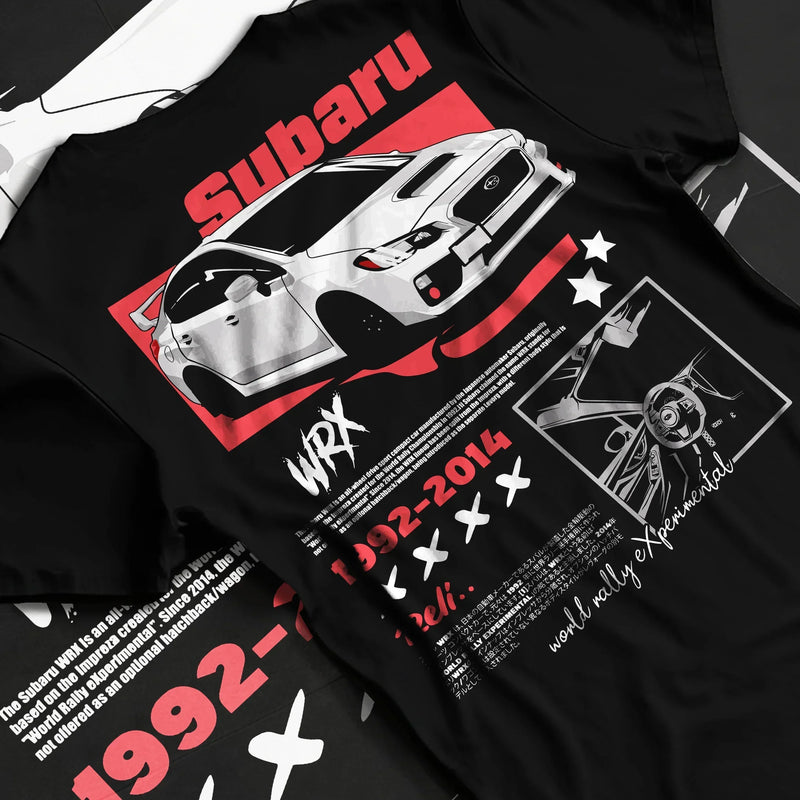 Black T-shirt featuring Subaru WRX rally graphic in bold red and white JDM streetwear design with performance-inspired artwork.