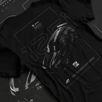 Black T-shirt laid flat with natural fabric folds, featuring BMW 750I rs turbo motorsport euro german street graphic.