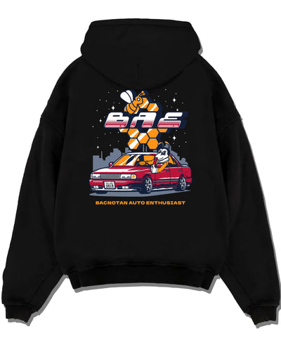 Black pullover hoodie laid flat on a white background, featuring street retro enthusiast racing performance motorsport graphic.