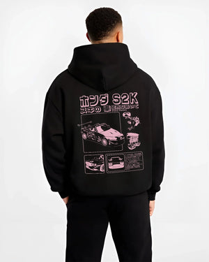Black hoodie worn by a male model, back view, featuring Honda S2000 jdm japanese street retro racing performance graphic.
