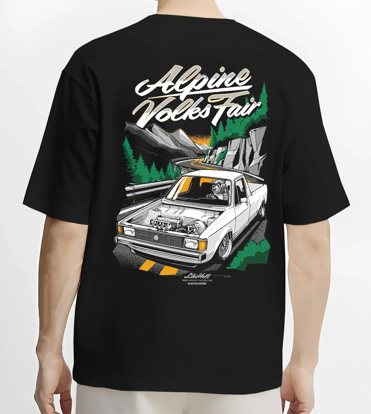 Black T-shirt worn by a male model, back view, featuring Volkswagen street retro racing performance motorsport automotive graphic.