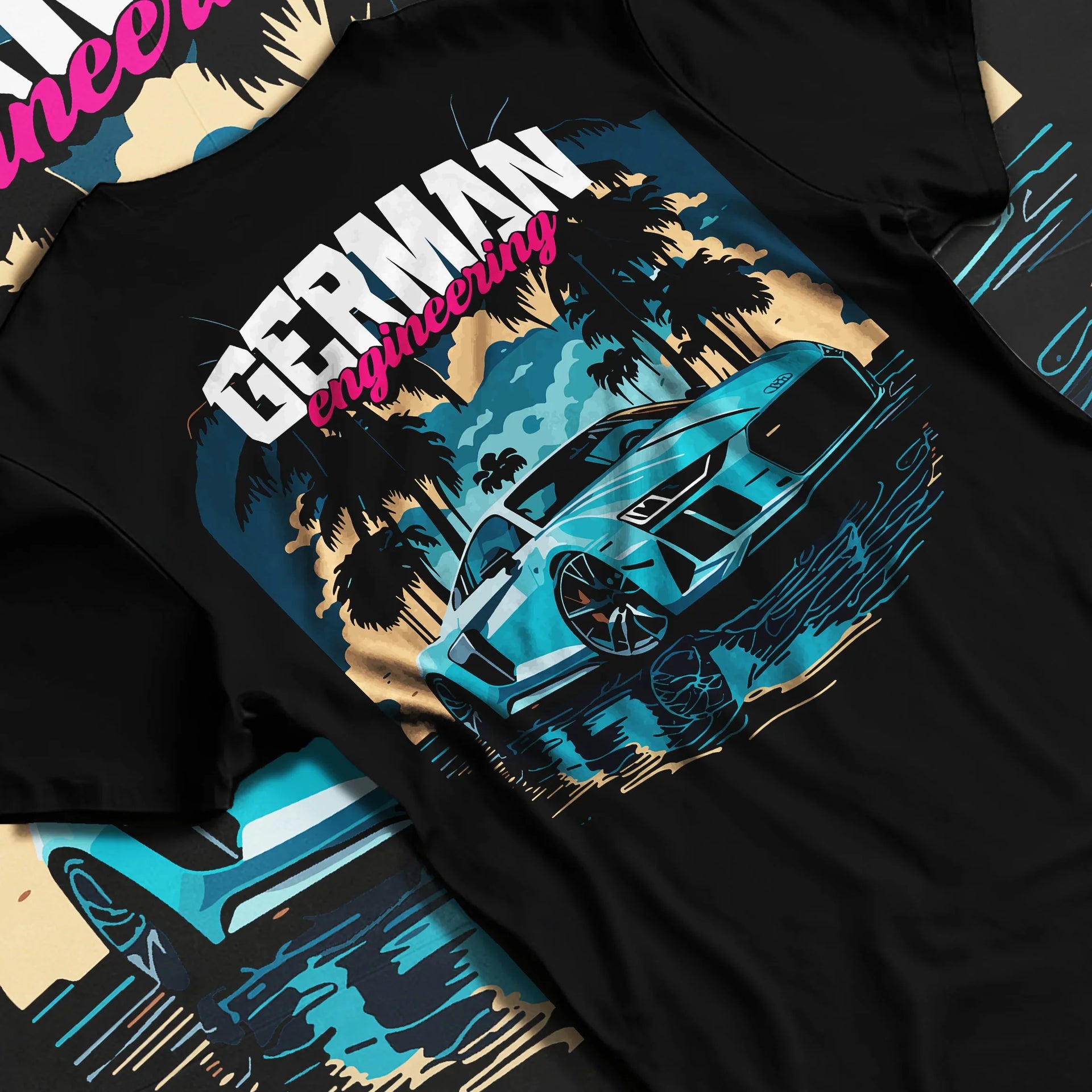 Black T-shirt laid flat with natural fabric folds, featuring Audi R8 german street racing performance motorsport automotive graphic.