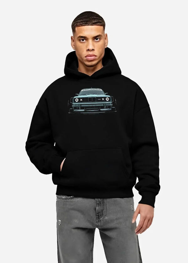 Black hoodie worn by a male model, front view, featuring BMW M3 rs drift classic racing street performance graphic.