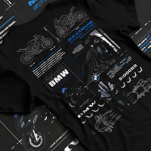 Black T-shirt laid flat with natural fabric folds, featuring BMW S1000RR racing drift german street speed performance graphic.
