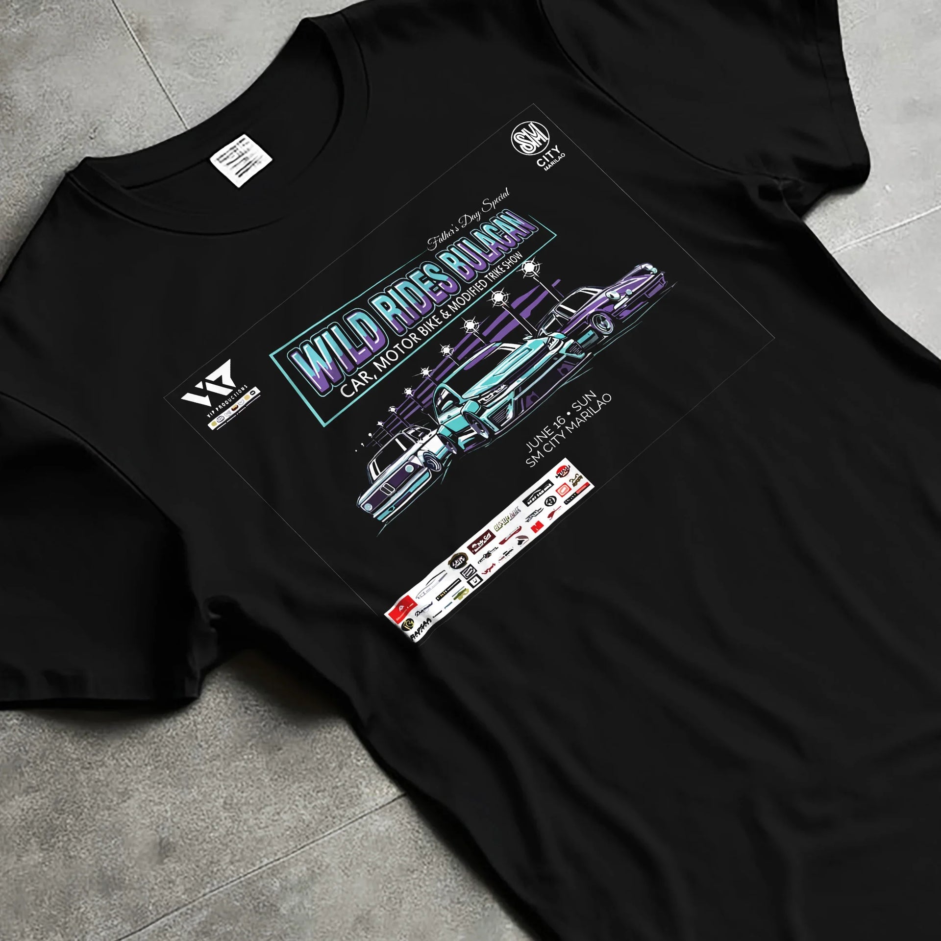 Black T-shirt laid flat with natural fabric folds, featuring racing tuner street show performance motorsport automotive graphic.