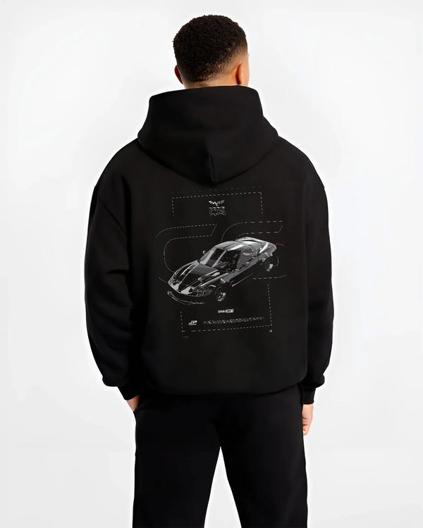 Black hoodie worn by a male model, back view, featuring Chevrolet Corvette C8R rs corvette racing motorsport american graphic.