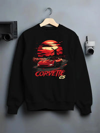 Black crewneck sweatshirt on a hanger against a grey wall, featuring Chevrolet Camaro racing drag american muscle street graphic.
