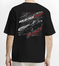 Black T-shirt worn by a male model, back view, featuring Chevrolet rs racing muscle street retro classic enthusiast graphic.