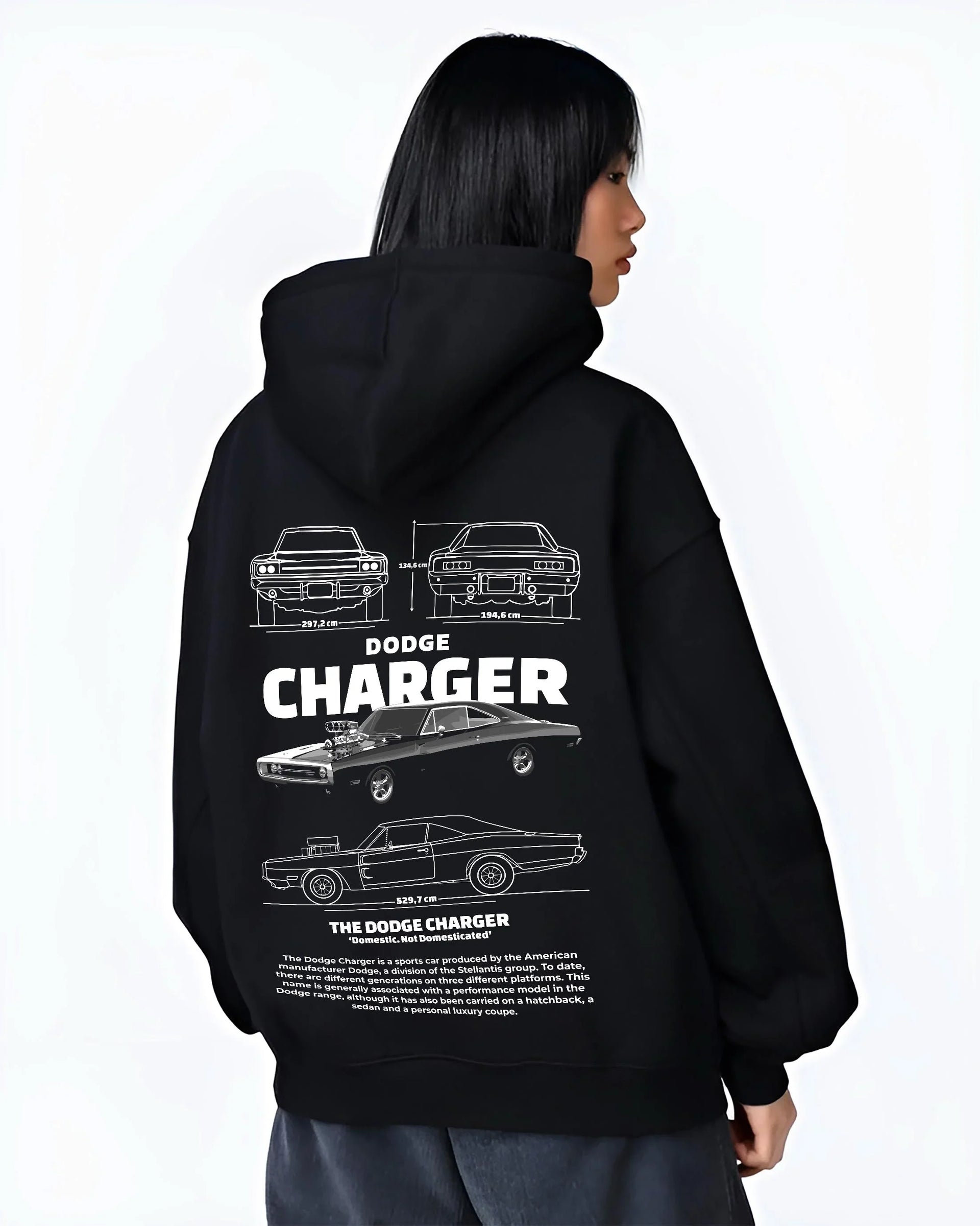 Black hoodie worn by a female model, back view, featuring Dodge Charger rs muscle street retro classic enthusiast graphic.