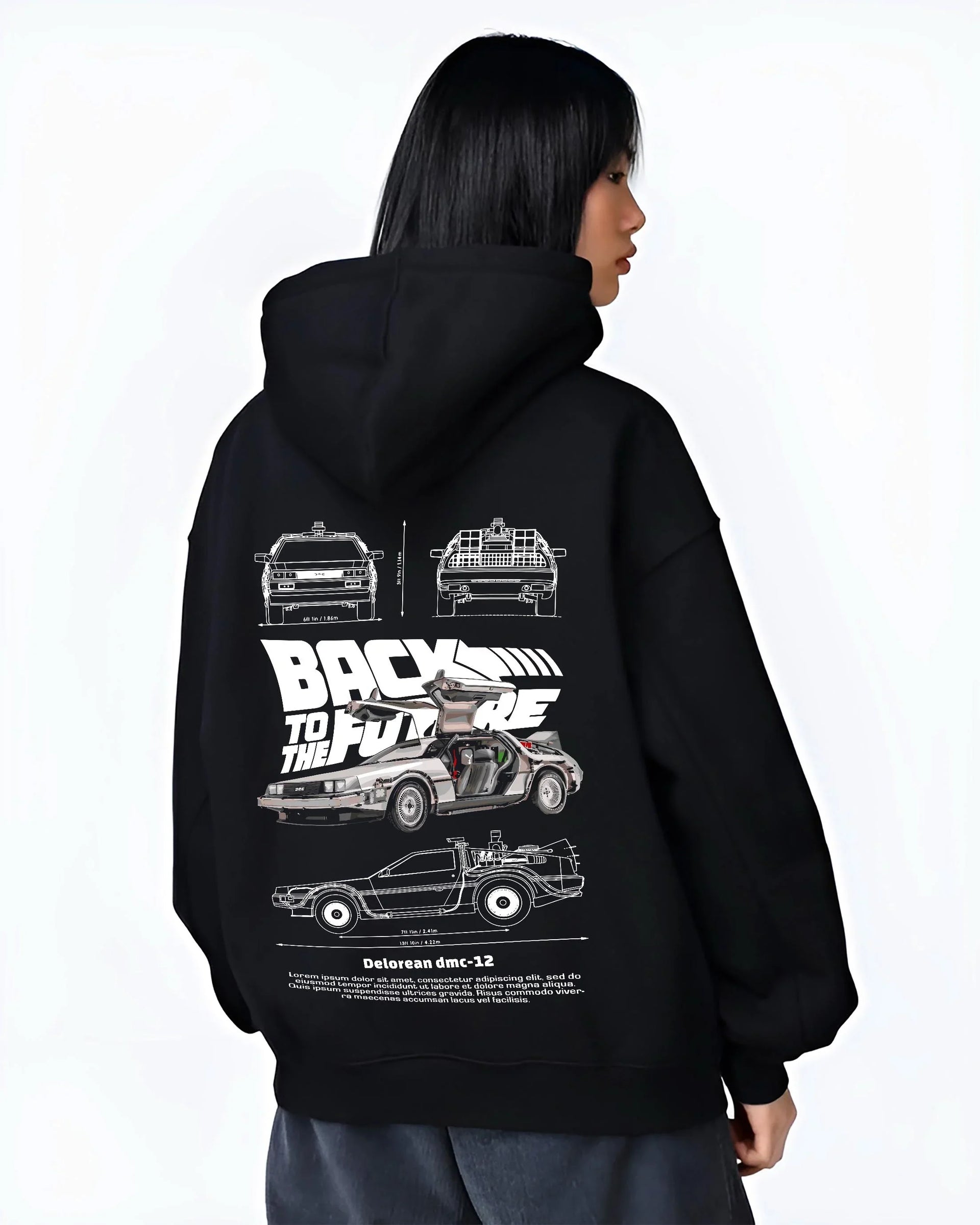 Black hoodie worn by a female model, back view, featuring DeLorean DMC-12 street retro racing performance motorsport dmcbtf.