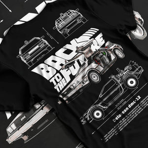Black T-shirt laid flat with natural fabric folds, featuring DeLorean DMC-12 street retro racing performance motorsport dmcbtf.