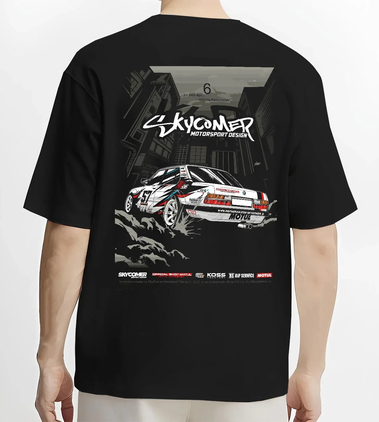 Black T-shirt worn by a male model, back view, featuring BMW rs turbo racing drift motorsport euro german street retro e28s5r.