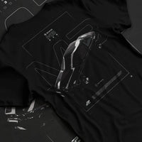 Black T-shirt laid flat with natural fabric folds, featuring BMW rs turbo racing drift motorsport german street retro graphic.