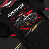 Black T-shirt laid flat with natural fabric folds, featuring BMW rs turbo ls racing motorsport euro street retro classic graphic.