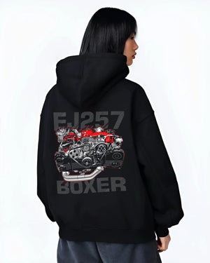Black hoodie worn by a female model, back view, featuring Subaru turbo turbocharged racing rally jdm japanese tuner power graphic.