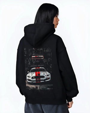 Black hoodie worn by a female model, back view, featuring Ford Mustang rs racing muscle street retro show graphic.