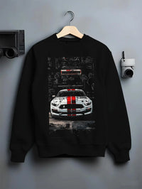 Black crewneck sweatshirt on a hanger against a grey wall, featuring Ford Mustang rs racing muscle street retro show graphic.