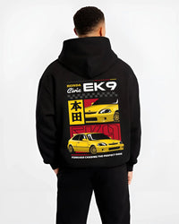 Black hoodie worn by a male model, back view, featuring Honda Civic racing jdm japanese street iconic performance graphic.