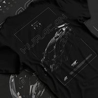 Black T-shirt laid flat with natural fabric folds, featuring Lamborghini Huracan gt3 evo racing enthusiast street graphic.