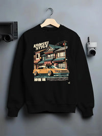 Black crewneck sweatshirt on a hanger against a grey wall, featuring racing drift jdm japanese street performance kansei.