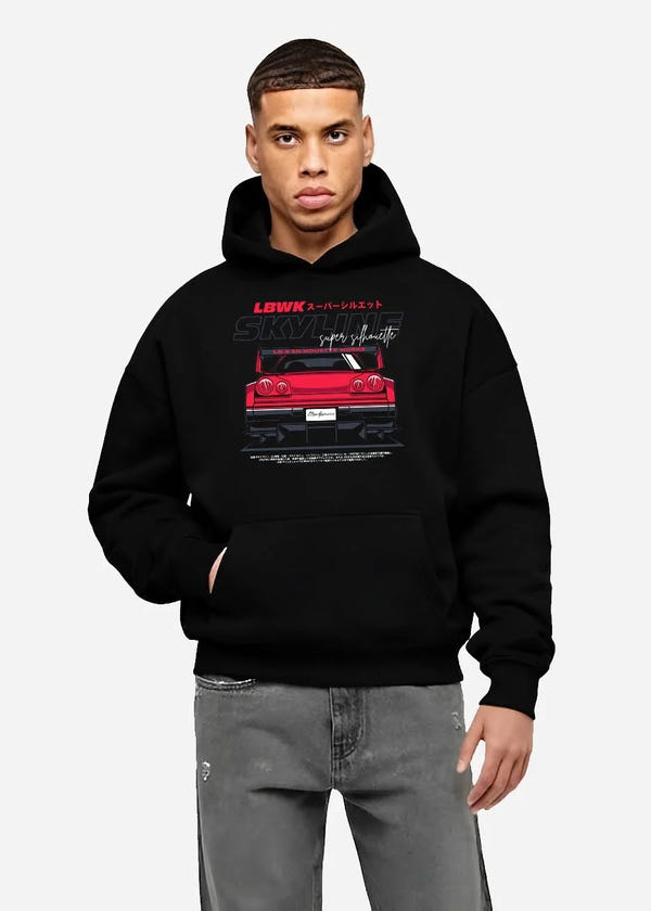 Black hoodie worn by a male model, front view, featuring NISSAN SKYLINE racing jdm widebody liberty walk street performance graphic.