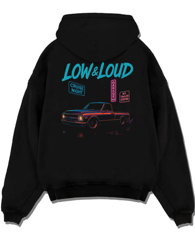 Black pullover hoodie laid flat on a white background, featuring street retro classic racing performance motorsport graphic.