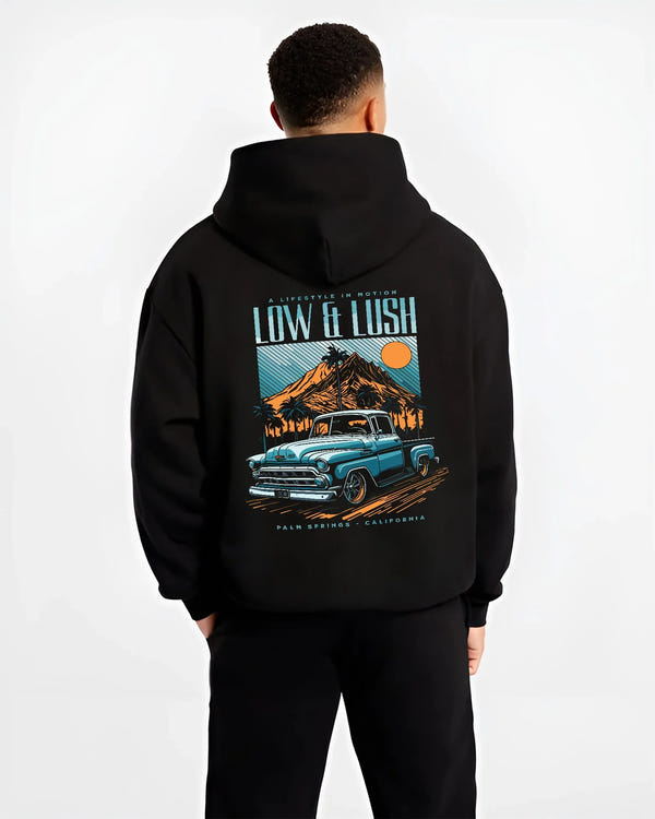 Black hoodie worn by a male model, back view, featuring Chevrolet retro classic racing street performance motorsport graphic.