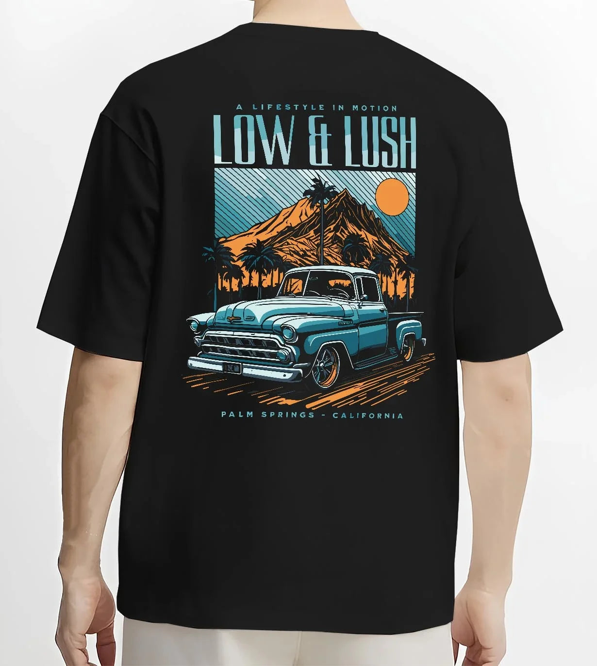 Black T-shirt worn by a male model, back view, featuring Chevrolet retro classic racing street performance motorsport graphic.