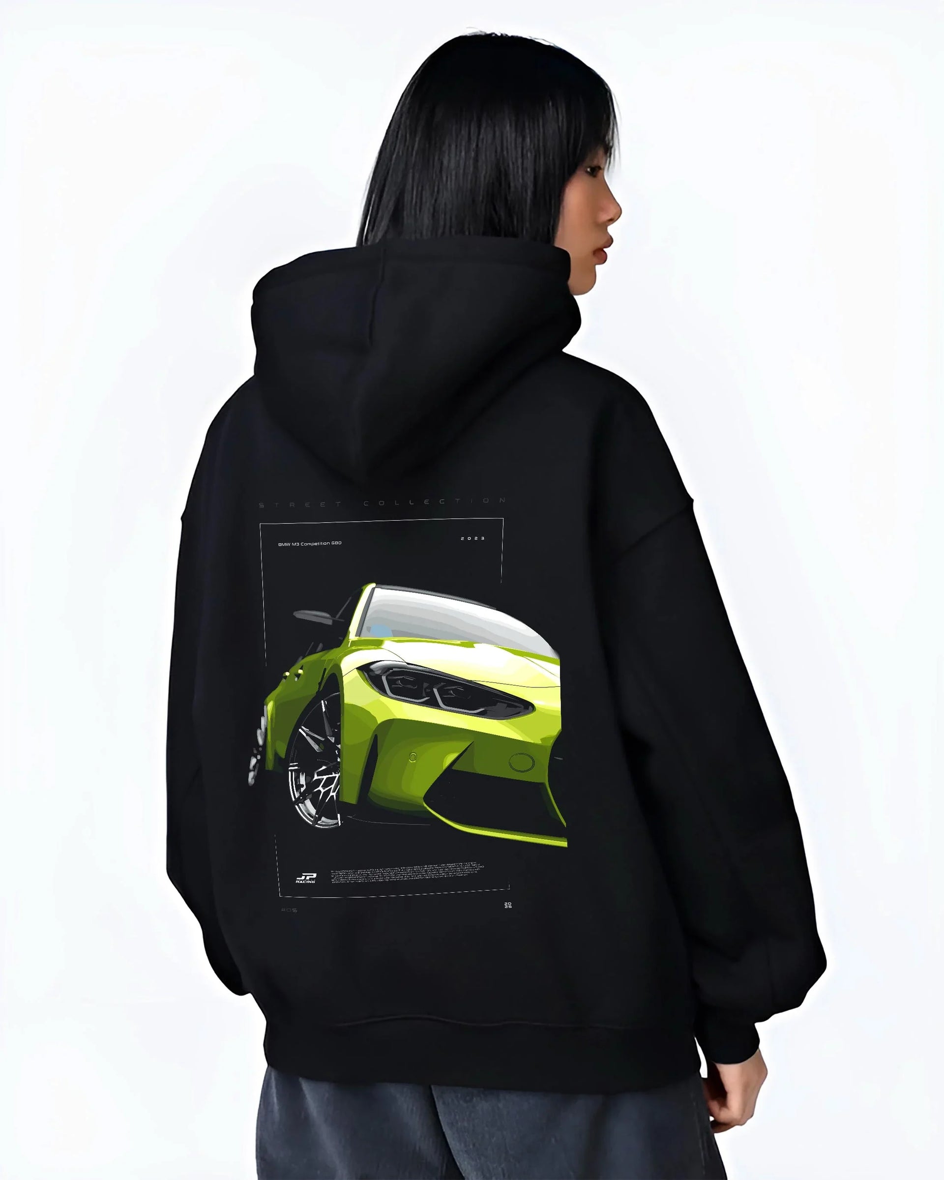 Black hoodie worn by a female model, back view, featuring BMW M3 rs turbo racing motorsport german street graphic.