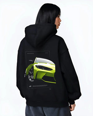 Black hoodie worn by a female model, back view, featuring BMW M3 rs turbo racing motorsport german street graphic.