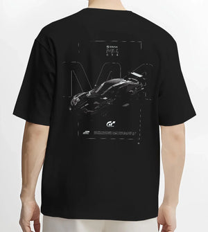 Black T-shirt worn by a male model, back view, featuring BMW M4 gt3 racing race gran turismo street performance graphic.
