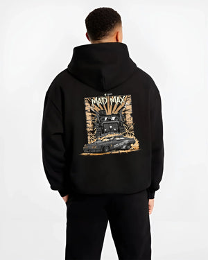 Black hoodie worn by a male model, back view, featuring enthusiast racing street performance motorsport automotive power madmx.