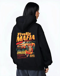 Black hoodie worn by a female model, back view, featuring Nissan Skyline racing drift japanese tuner street performance graphic.