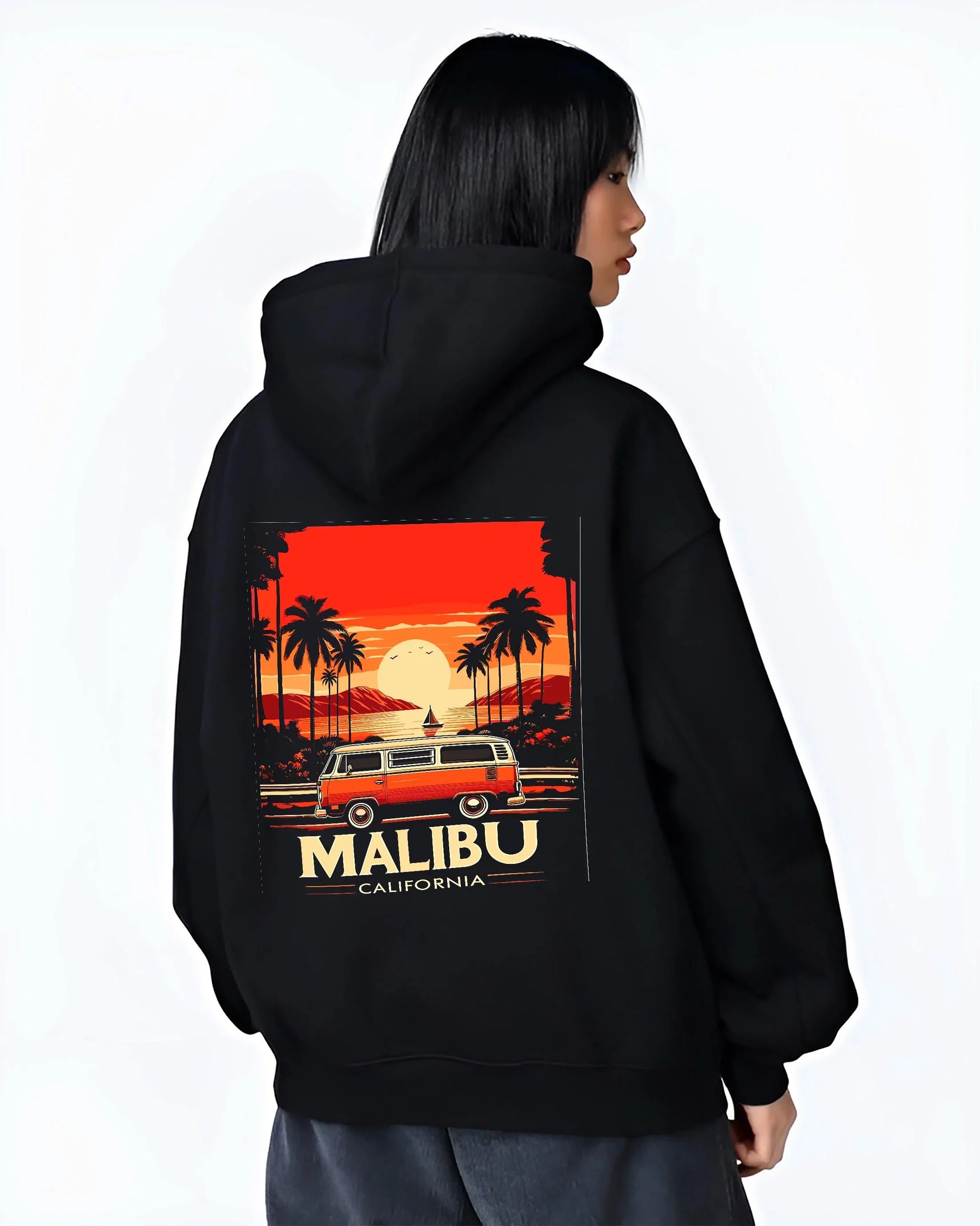 Black hoodie worn by a female model, back view, featuring retro vintage racing street performance motorsport automotive graphic.