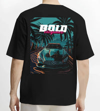 Black T-shirt worn by a male model, back view, featuring Mercedes-Benz street retro racing performance motorsport graphic.