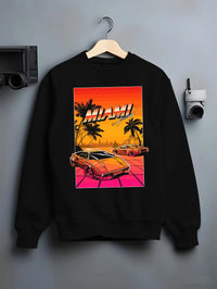 Black crewneck sweatshirt on a hanger against a grey wall, featuring street retro racing performance motorsport automotive miams1.