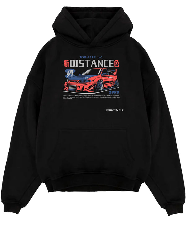 Black pullover hoodie laid flat on a white background, featuring Mitsubishi EVO turbo racing drift jdm japanese street graphic.