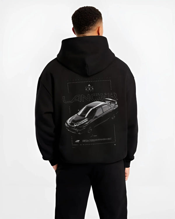 Black hoodie worn by a male model, back view, featuring Mitsubishi Lancer evo turbo racing drift jdm japanese street graphic.