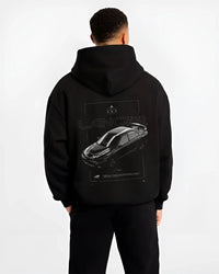 Black hoodie worn by a male model, back view, featuring Mitsubishi Lancer evo turbo racing drift jdm japanese street graphic.