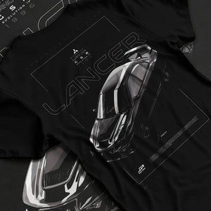 Black T-shirt laid flat with natural fabric folds, featuring Mitsubishi Lancer evo turbo racing drift jdm japanese street graphic.