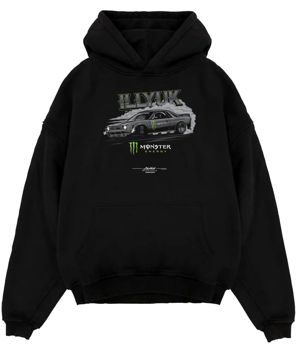 Black pullover hoodie laid flat on a white background, featuring rs turbo racing drift motorsport tuner street monster graphic.