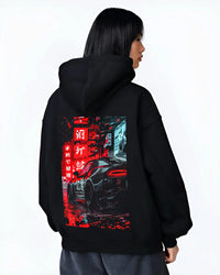 Black hoodie worn by a female model, back view, featuring racing drift jdm japanese street enthusiast performance graphic.