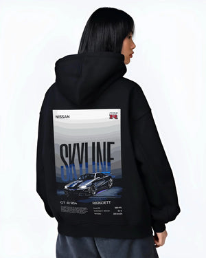 Black hoodie worn by a female model, back view, featuring Nissan Skyline R34 gt r r34 skyline rb26 jdm legend graphic.