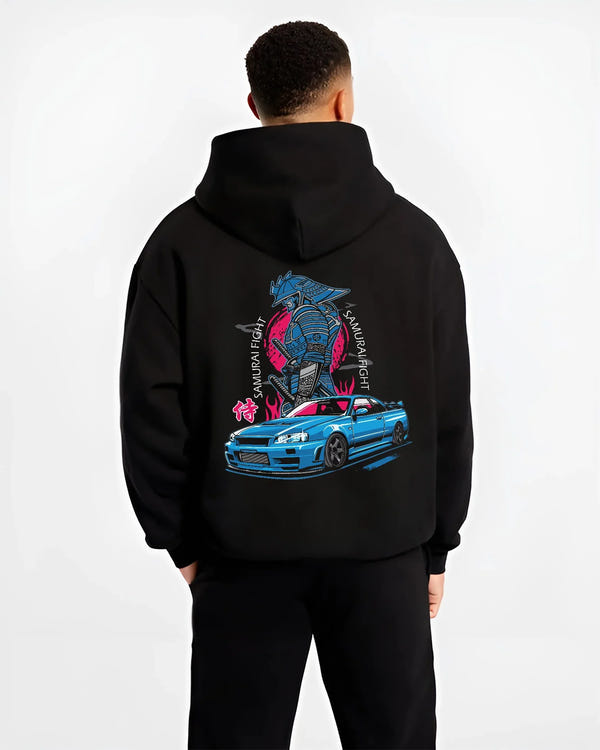 Black hoodie worn by a male model, back view, featuring Nissan Skyline R34 gt r r34 skyline drift jdm japanese street graphic.