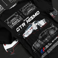 Black T-shirt laid flat with natural fabric folds, featuring Nissan Skyline R34 gtr r34 skyline turbo turbocharged racing nis7.