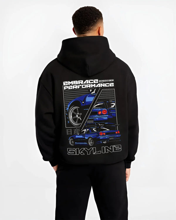 Black hoodie worn by a male model, back view, featuring Nissan SKYLINE r32 turbo turbocharged racing drift jdm street graphic.
