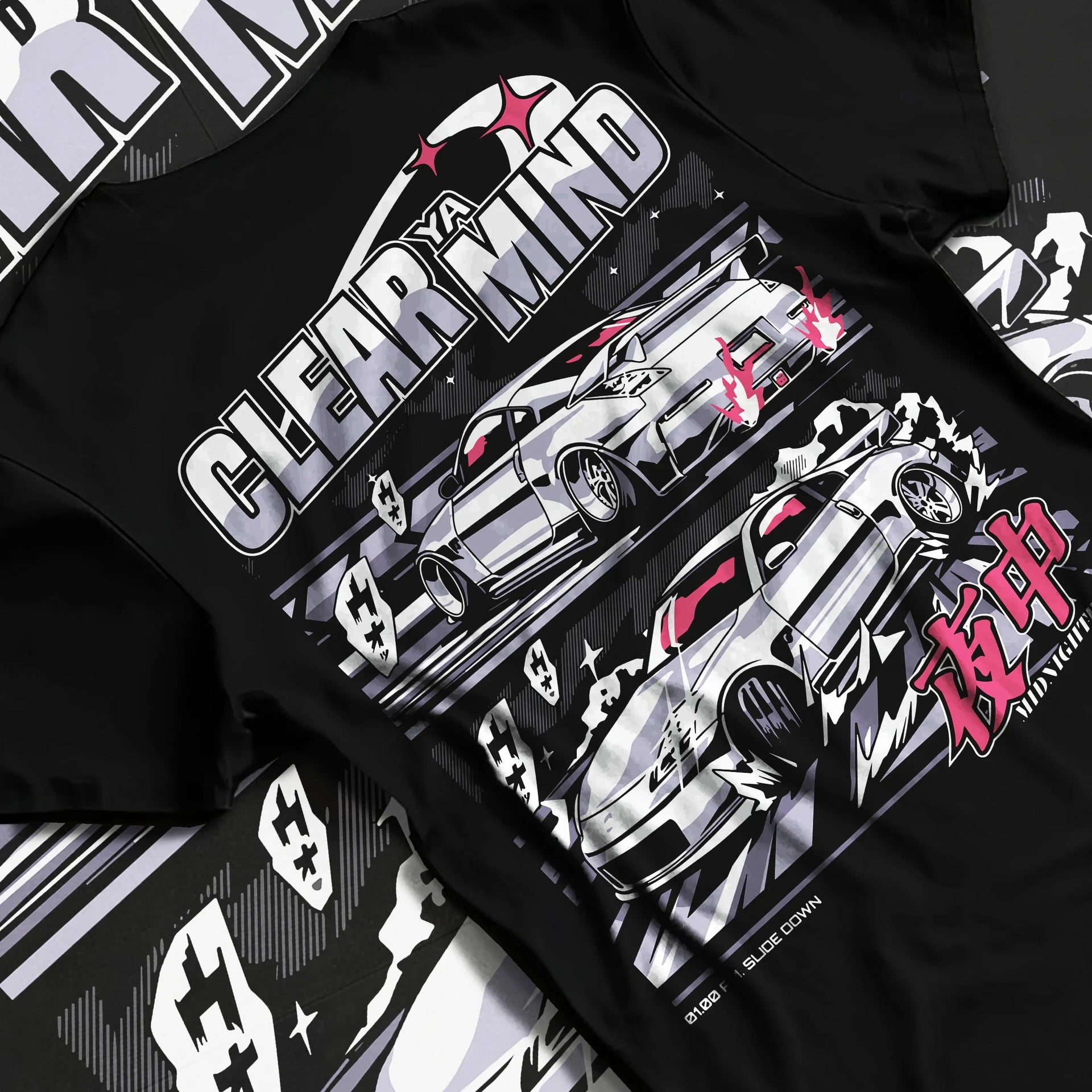 Black T-shirt laid flat with natural fabric folds, featuring Nissan race drift jdm japanese tuner street midnight graphic.