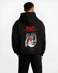 Black hoodie worn by a male model, back view, featuring street retro racing performance motorsport automotive enthusiast osclwb.