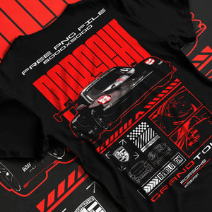 Black T-shirt laid flat with natural fabric folds, featuring Porsche rs racing race motorsport german street performance graphic.