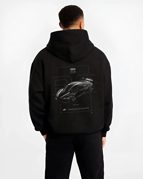 Black hoodie worn by a male model, back view, featuring Audi R8 turbo racing german street performance motorsport graphic.